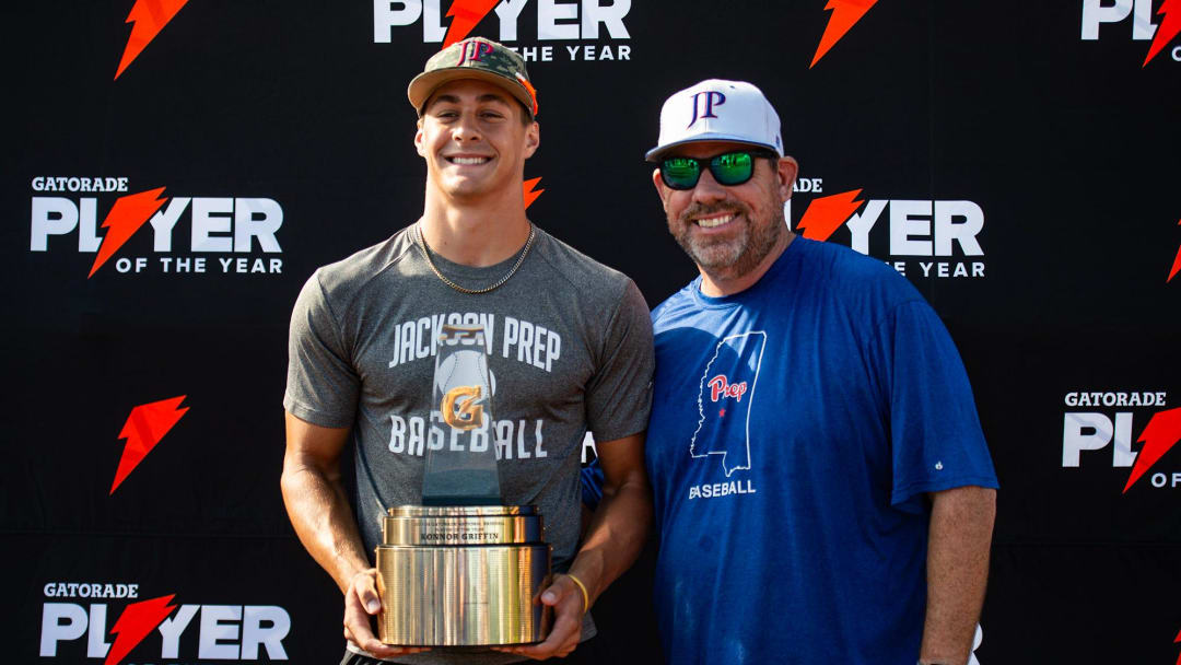 Konnor Griffin poses for a photo with his coach, Brent Heavener, after receiving his trophy for Gatorade National Baseball Player of the Year at Jackson Prep in Flowood, Miss., on Thursday, June 6, 2024.