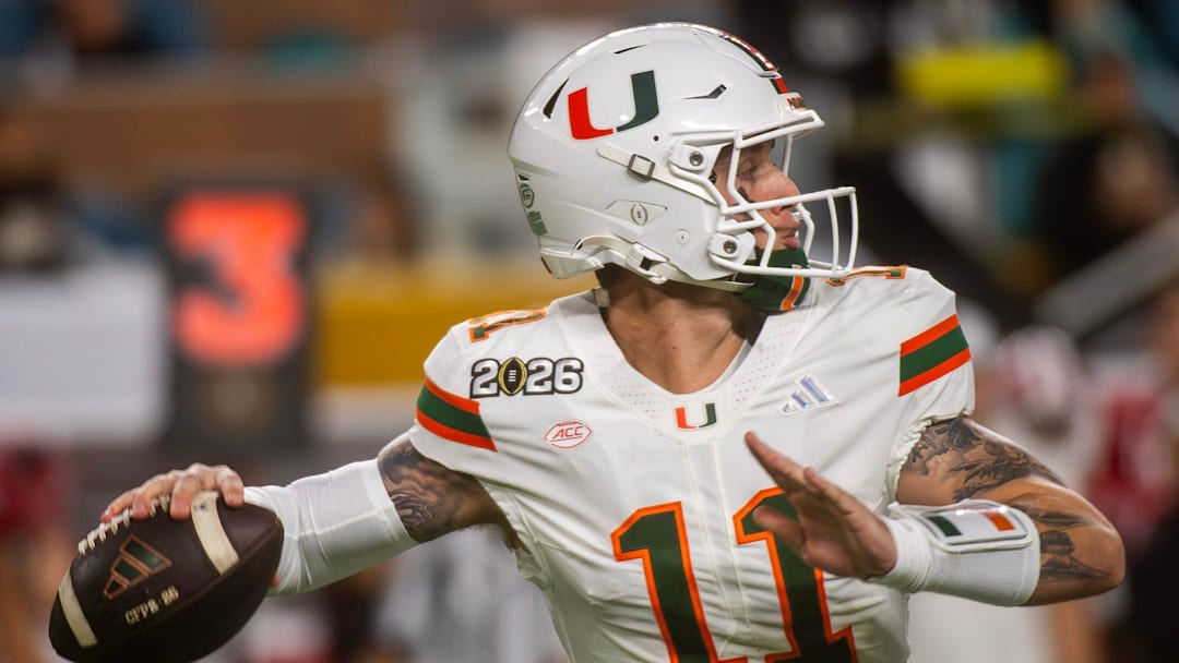 Miami's Carson Beck (11) throws during the College Football Playoff National Championship college football game at Hard Rock Stadium in Miami Gardens on Monday, Jan. 19, 2026.