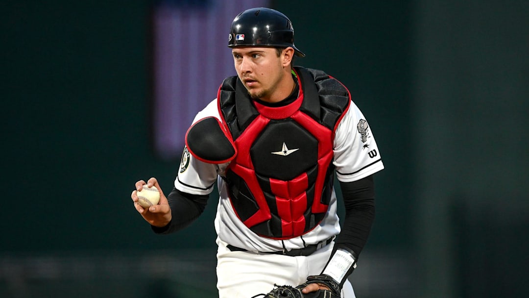 Lugnuts' Daniel Susac shows the ball to an umpire in the eighth inning during the game against the Whitecaps on Tuesday, April 11, 2023, at Jackson Field in Lansing.