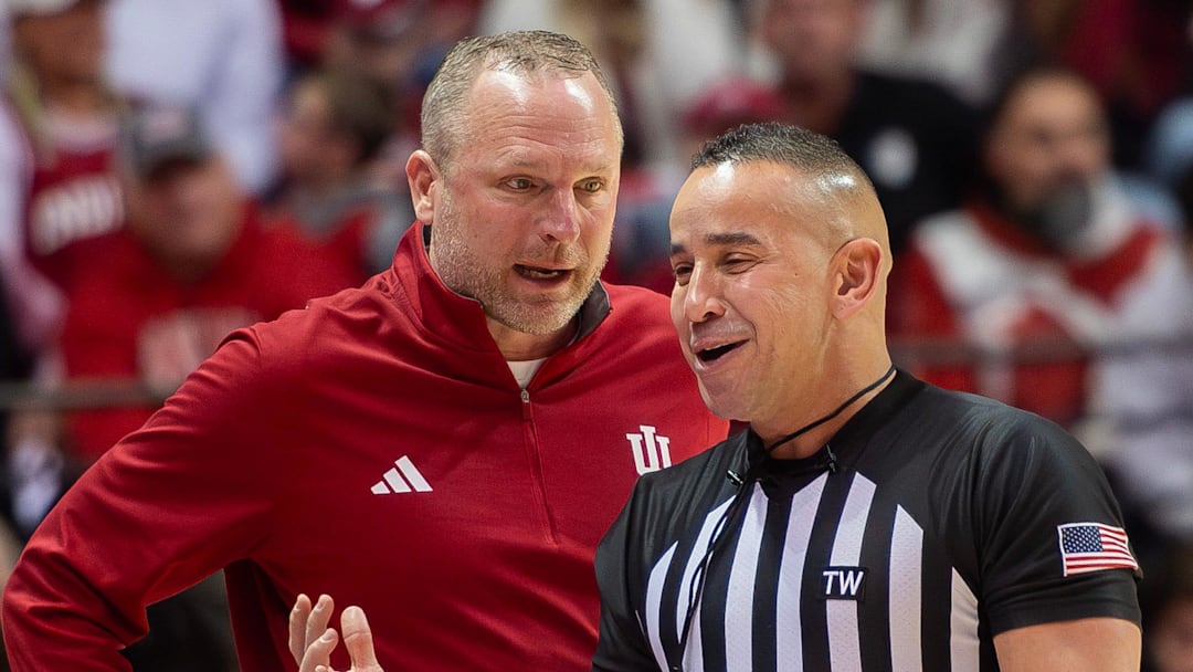 Indiana Head Cozch Darian DeVries talks with an official during the Indiana versus Wisconsin men's basketball game at Simon Skjodt Assembly Hall on Saturday, Feb. 7, 2026.
