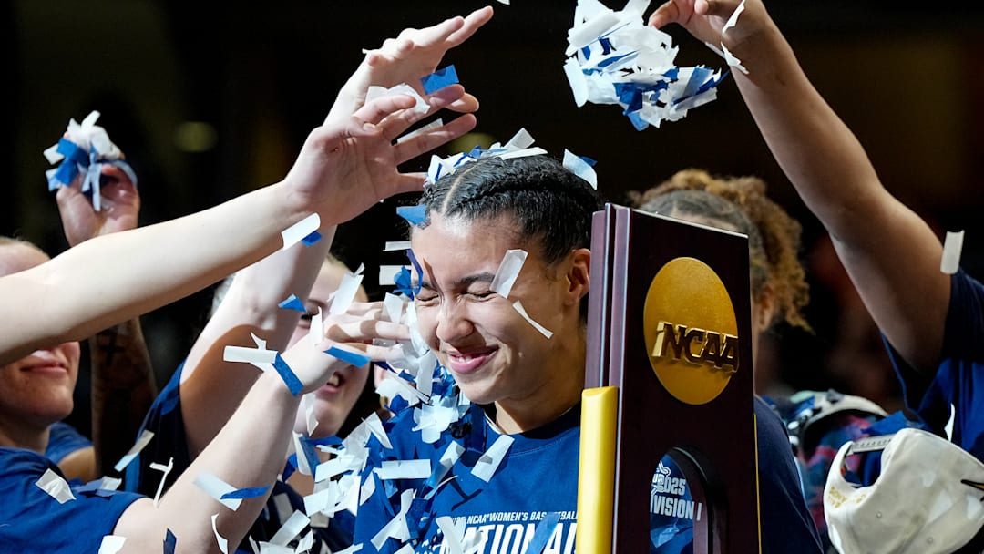 Azzi Fudd is showered with confetti after UConn won the national title Sunday in Tampa.