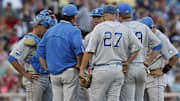 Jun 18, 2013; Omaha, NE, USA; UCLA Bruins head coach John Savage (22) talks to his team during the game against the North Carolina State Wolfpack during the College World Series at TD Ameritrade Park. Mandatory Credit: Bruce Thorson-Imagn Images