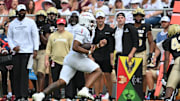 Sep 20, 2025; Blacksburg, Va.; Virginia Tech quarterback Kyron Drones (1) runs the ball during the third quarter.