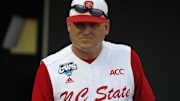 Jun 20, 2013; Omaha, NE, USA; North Carolina State Wolfpack head coach Eliot Avent (9) watches his team prior to the game against the North Carolina Tarheels during the College World Series at TD Ameritrade Park. Mandatory Credit: Bruce Thorson-Imagn Images