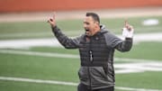 Texas Longhorns head coach Steve Sarkisian heads back to the practice field at DKR working on football drills during spring football on Tuesday, March 21, 2023.

Sark