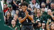 Michigan State's Jeremy Fears Jr. celebrates after drawing a Stony Brook charge during the first half on Thursday, Dec. 21, 2023, at the Breslin Center in East Lansing.