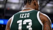 Former Michigan State football receiver Keon Coleman wears a Steven Izzo jeresey during the senior night celebration after the game against Northwestern on Wednesday, March 6, 2024, at the Breslin Center in East Lansing.