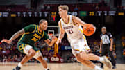 Gophers forward Cade Tyson (10) drives against NDSU during an exhibition game at Williams Arena. 