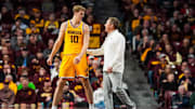 Gophers forward Cade Tyson (10) with head coach Niko Medved during the 2025-26 opener against Gardner-Webb. Tyson finished with 30 points. 
