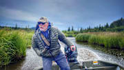My Down Forloh Jacket and hoodie kept me warm when taking a jet sled up an Alaskan creek. 
