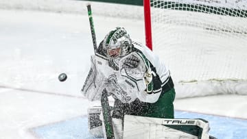 Michigan State's Trey Augustine saves a Notre Dame goal attempt during the second period earlier this season. Augustine has had a phenomenal freshman campaign which continued this past weekend against Penn State.