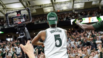 Michigan State's Cassius Winston celebrates after beating Ohio State on Sunday, March 8, 2020, at the Breslin Center in East Lansing. The Spartans won a share of the Big Ten Championship.

200308 Msu Osu 252a