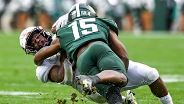 Michigan State's Angelo Grose, right, tackles Minnesota's Mohamed Ibrahim during the second quarter on Saturday, Sept. 24, 2022, at Spartan Stadium in East Lansing.

220924 Msu Minn Fb 096a