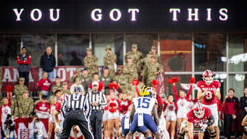 Indiana's Kurtis Rourke (9) prepares to take the snap during the Indiana versus Michigan football game at Memorial Stadium on Friday, Nov. 9, 2024.