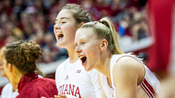 Indiana's Henna Sandvik (21) and Lilly Meister (52) cheer on the Hoosiers during the second half of the Indiana versus Butler women's basketball game at Simon Skjodt Assembly Hall on Wednesday, Dec. 21, 2022.