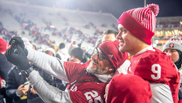 Indiana's Kurtis Rourke (9) poses witha fan after the Indiana versus Purdue football game at Memorial Stadium on Saturday, Nov. 30, 2024.