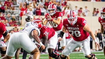 Indiana's Alberto Mendoza (16) takes the snap during the Indiana versus Western Illinois football game at Memorial Stadium on Friday, Sept. 6, 2024.