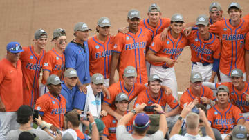 Jun 9, 2024; Clemson, SC, USA; The Florida Gators pose for a photo after their win against Clemson in the NCAA baseball Clemson Super Regional at Doug Kingsmore Stadium. Mandatory Credit: Ken Ruinard - USA TODAY Sports