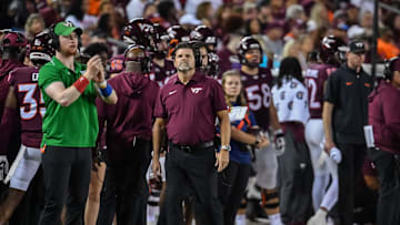 Sep 13, 2025; Blacksburg, Virginia, USA;  Virginia Tech Hokies head coach Brent Pry looks at the scoreboard during the second quarter at Lane Stadium. Mandatory Credit: Brian Bishop-Imagn Images