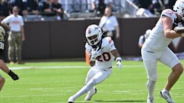 Sep 20, 2025; Blacksburg, Virginia, USA;  Virginia Tech Hokies running back P.J. Prioleau (20) runs the ball during the first quarter against the Wofford Terriers at Lane Stadium. Mandatory Credit: Brian Bishop-Imagn Images