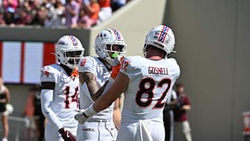 Sep 20, 2025; Blacksburg, Virginia, USA;  Virginia Tech Hokies tight end Benji Gosnell (82) congratulates Virginia Tech Hokies wide receiver Ayden Greene (0) on a touchdown during the second quarter against the the Wofford Terriers at Lane Stadium. Mandatory Credit: Brian Bishop-Imagn Images