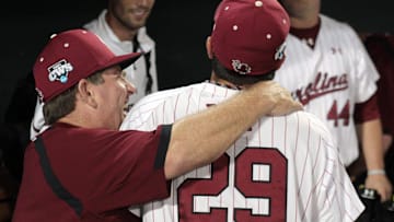June 22, 2012; Omaha, NE, USA;  South Carolina Gamecocks head coach Ray Tanner and Michael Roth (29) celebrate after defeating the Arkansas Razorbacks in game thirteen of the 2012 College World Series at TD Ameritrade Park. South Carolina won 3-2. Mandatory Credit: Bruce Thorson-Imagn Images
