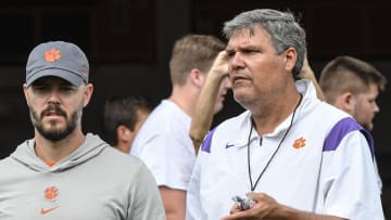 Clemson offensive coordinator Garrett Riley, left, and offensive line coach Matt Luke look at offensive linemen during the 2024 Dabo Swinney Football Camp in Clemson in Clemson, S.C. Tuesday, June 4, 2024.