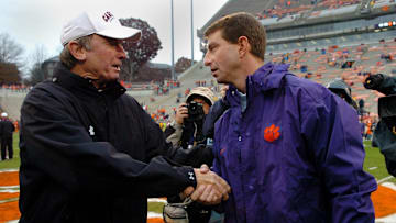Clemson interim head coach Dabo Swinney, right, shakes hands with South Carolina head coach Steve Spurrier before the start of their game Saturday, November 29, 2008 at Clemson's Memorial Stadium.

Clemson South Carolina Football