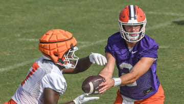 Clemson running back Phil Mafah (7) takes the handoff from quarterback Cade Klubnik (2) during the Clemson second August practice in Clemson, S.C. Friday August 2, 2024.