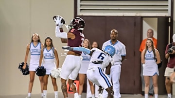 Sep 13, 2025; Blacksburg, Virginia, USA;  Virginia Tech Hokies wide receiver Donavon Greene (3) catches a pass for a touchdown as Old Dominion Monarchs cornerback Zion Frink (6) defends during the third quarter at Lane Stadium. Mandatory Credit: Brian Bishop-Imagn Images
