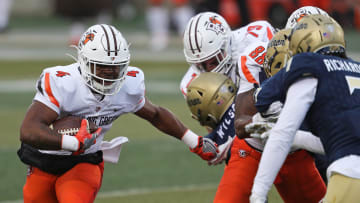 Bowling Green Falcons running back Terion Stewart (4) rushes for a short gain inside the 10 yard line during the first half of an NCAA football game at InfoCision Stadium, Saturday, Dec. 5, 2020, in Akron, Ohio. [Jeff Lange/Beacon Journal]

Zipsfb 16