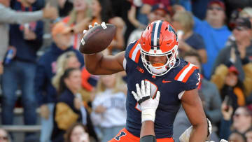 Oct 21, 2023; Champaign, Illinois, USA;  Illinois Fighting Illini running back Kaden Feagin (3) is lifted up by teammate Isaiah Adams (78) during the second half at Memorial Stadium. Mandatory Credit: Ron Johnson-USA TODAY Sports