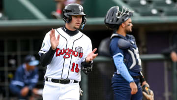 Lugnuts' Daniel Susac celebrates after scoring a run against the Whitecaps in the first inning on Tuesday, April 11, 2023, at Jackson Field in Lansing.

230411 Lugnuts Whitecaps Baseball 112a