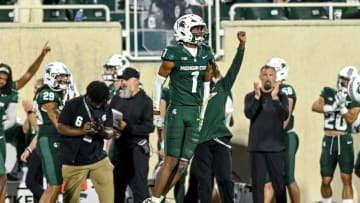 Michigan State's Jaden Mangham celebrates after an interception during the fourth quarter in the