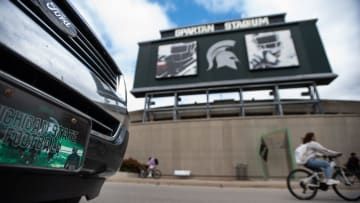 Ousted MSU football coach Mel Tucker is featured on an Michigan State Football license plate on a vehicle seen parked outside Spartan Stadium, Wednesday, Sept. 13, 2023, in East Lansing.