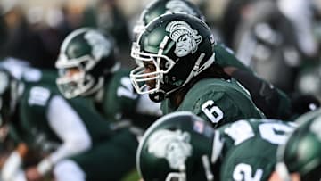 Michigan State's Maliq Carr and the Spartans sport the gruff Sparty helmet for the game against Indiana on Saturday, Nov. 19, 2022, at Spartan Stadium in East Lansing.

221119 Msu Indiana 020a