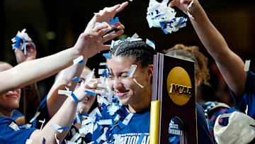 Azzi Fudd is showered with confetti after UConn won the national title Sunday in Tampa.
