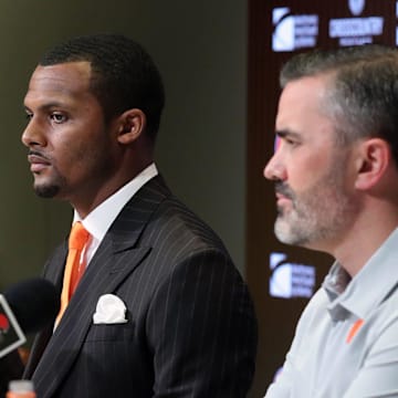 Cleveland Browns quarterback Deshaun Watson, center, along with General Manager Andrew Berry, left, and head coach Kevin Stefanski, right, field questions from reporters during Watson's introductory press conference at the Cleveland Browns Training Facility in Berea.