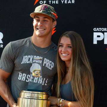 Konnor Griffin poses with his girlfriend, Dendy Hogan, after receiving his trophy for Gatorade National Baseball Player of the Year at Jackson Prep in Mississippi on June 6, 2024.