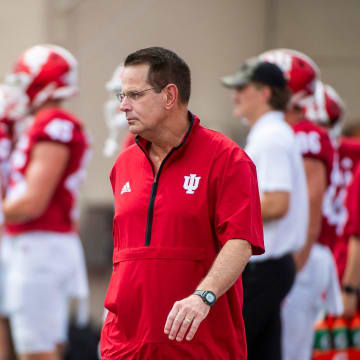 Indiana Head Coach Curt Cignetti walks among the players before the start of the Indiana versus Florida International football game at Memorial Stadium on Saturday, Aug. 31, 2024.