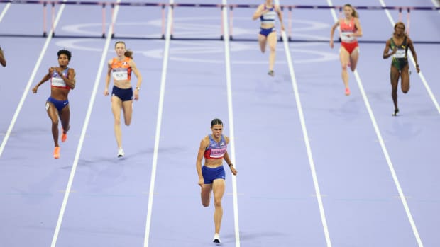 Sydney McLaughlin-Levrone crosses the finish line to win gold in the 400-meter hurdles at the Paris Olympics.