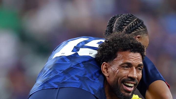 Forty-year-old Cape Verde goalkeeper Vozinha -- 'Granny' -- carries teammate Dailon Livramento after the Blue Sharks earned a scoreless draw against Saudi Arabia in the teams' World Cup group stage match June 26 in Houston.