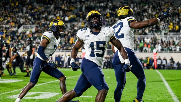 Michigan's Ernest Hausmann celebrates his defensive stop against Michigan State during the third quarter on Saturday, Oct. 21, 2023, at Spartan Stadium in East Lansing.