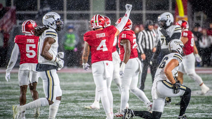 Indiana's Aiden Fisher (4) celebrates a stop during the Indiana versus Purdue football game at Memorial Stadium on Saturday, Nov. 30, 2024.
