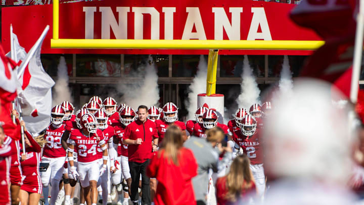 Indiana Head Coach Curt Cignetti leads the Hoosier onto the field before the start of the Indiana versus Nebraska football game at Memorial Stadium on Saturday, Oct. 19, 2024.