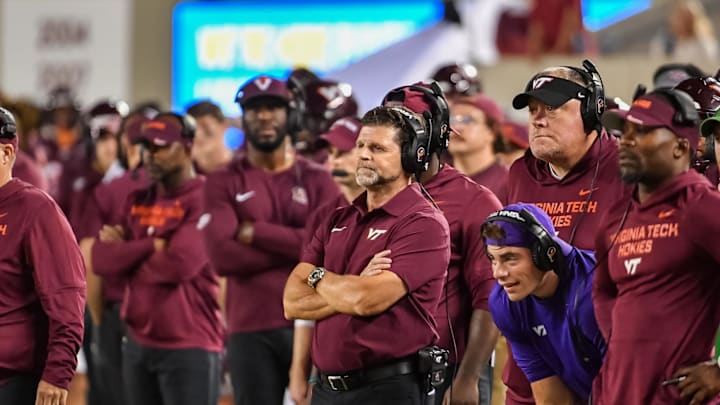 Sep 13, 2025; Blacksburg, Virginia, USA;  Virginia Tech Hokies head coach Brent Pry watches from the sideline during the third quarter at Lane Stadium. Mandatory Credit: Brian Bishop-Imagn Images