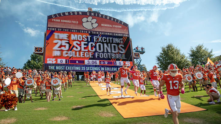 The Clemson football team runs down the hill, dubbed as the most exciting 25 seconds in college football, before the game against Syracuse in Clemson, South Carolina Saturday, Oct 24, 2020.