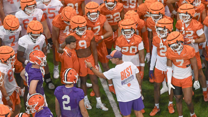 Clemson head coach Dabo Swinney talks with players during August practice in Clemson, S.C. Friday August 2, 2024.