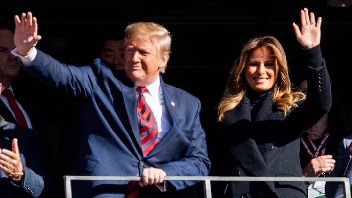 President Donald Trump and First Lady Melania Trump wave during the first quarter of the Alabama vs. LSU game  at Bryant-Denny Stadium in Tuscaloosa, Ala., on Saturday November 9, 2019.

Trump901