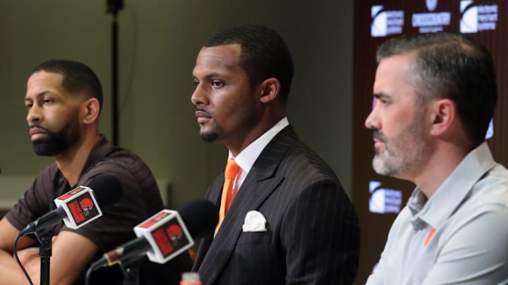 Cleveland Browns quarterback Deshaun Watson, center, along with General Manager Andrew Berry, left, and head coach Kevin Stefanski, right, field questions from reporters during Watson's introductory press conference at the Cleveland Browns Training Facility in Berea.